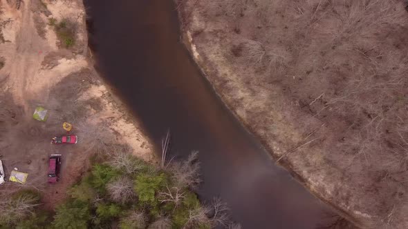 Off-Road Vehicles Park At The Riverside Of Muskegon River In Leota, Michigan. aerial alt