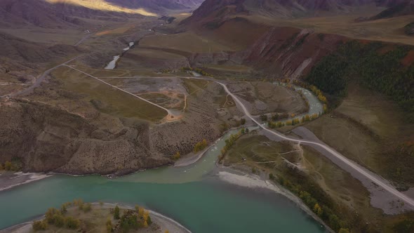 Confluence of Chuya and Katun Rivers in Autumn. Aerial View. The Altai Mountains alt