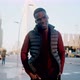 Stylish Black Man Walking Along Street - VideoHive Item for Sale