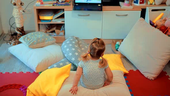 Little Girl Watching Cartoon. Kids Leisure And Entertainment. Children Watching Fairy Tale Story. alt