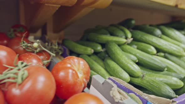 Large variety of vegetables and fruits on a supermarket shelves alt