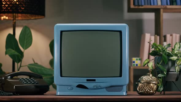 Old Television with Grey Interference Screen on Home Background alt