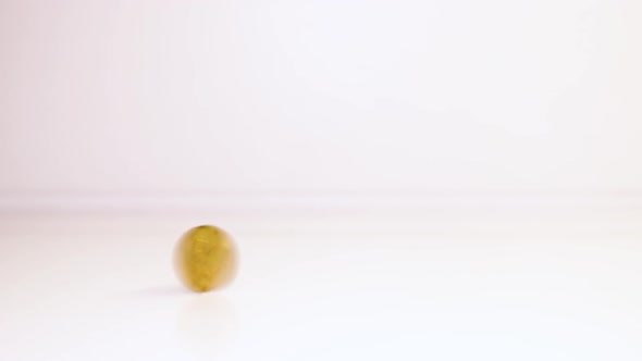 The coin spins around its axis and stops. Investment concept. Metallic currency. Close-up action.