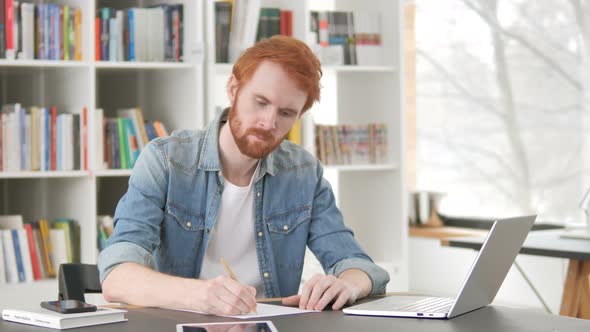 Casual Redhead Man Writing Letter alt