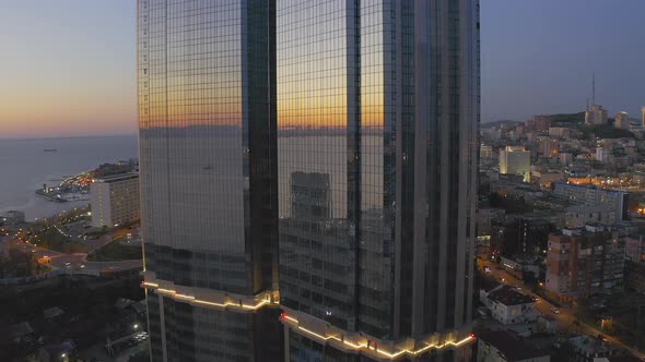Drone View of a Modern Skyscraper Located in the Center of Vladivostok alt