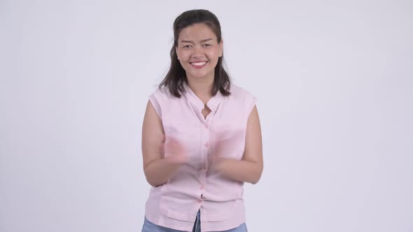 Happy Young Beautiful Asian Businesswoman Clapping Hands alt