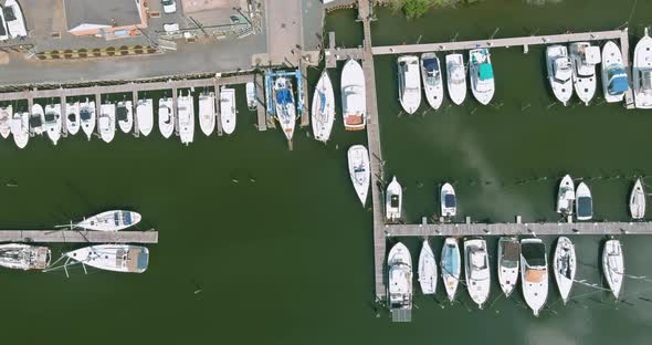 Aerial view panorama of wood platform for boat in the ocean little pier marina alt