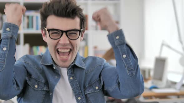 Creative Man Celebrating Success alt