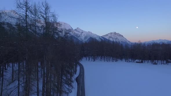Ascending through trees, view to Mieminger Mountains, Bavaria alt