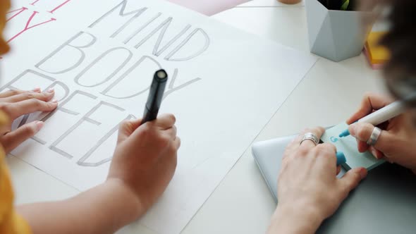 Social Activists Making Women Empowerment Posters Getting Ready for Feminists Demonstration alt