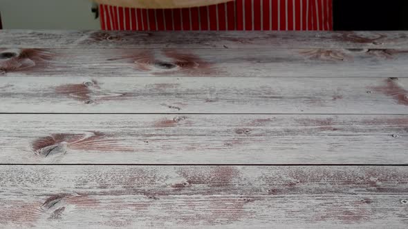 Chef Puts on Table Homemade Pizza with Cheese Chicken Meat Olives and Basil Leaves alt