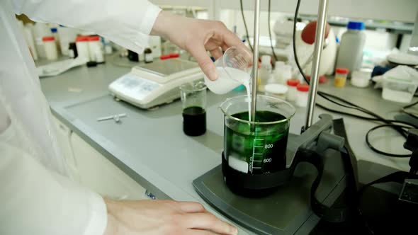 Chemical Reaction in Chemical Laboratory, Mixing Liquid Reagents in Laboratory