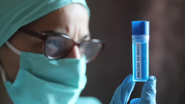 Doctor holding a recipient with the coronavirus COVID-19 vaccine