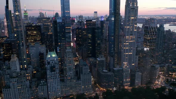 Manhattan Skyline at Night with Flashing City Lights in New York City at Central Park  alt