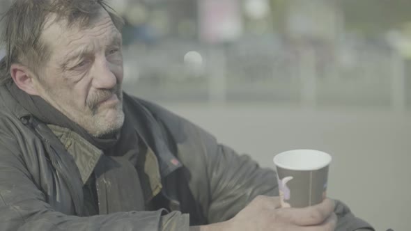 Beggar Homeless Man Tramp. Poverty. Vagrancy. Kyiv. Ukraine. alt