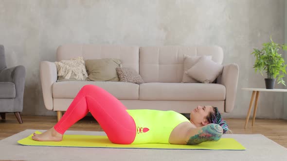 Fat Woman Newcomer in Sport Is Doing Abs Exercise at Home Lying on Mat
