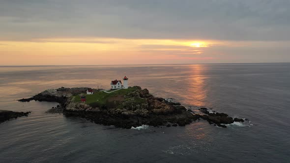 Nubble Lighthouse in Maine at Sunrise Drone Video