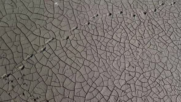 Top View of Boat at the Shore of Dried Up Sea Global Warming and Drought Concept alt