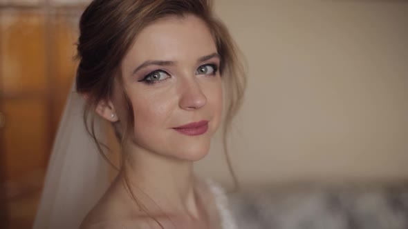 Beautiful and Lovely Bride in Night Gown and Veil. Wedding Morning. Slow Motion alt