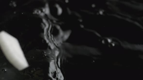 Throwing cut Chinese radish into boiled water. Slow Motion. alt