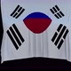 The piece of cloth falls with the flag of the State of Korea to cover the product - VideoHive Item for Sale