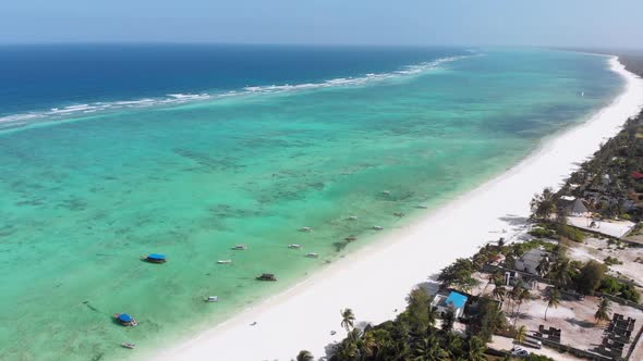 Ocean Coastline Barrier Reef By Beach Hotels at Low Tide Zanzibar Aerial View alt