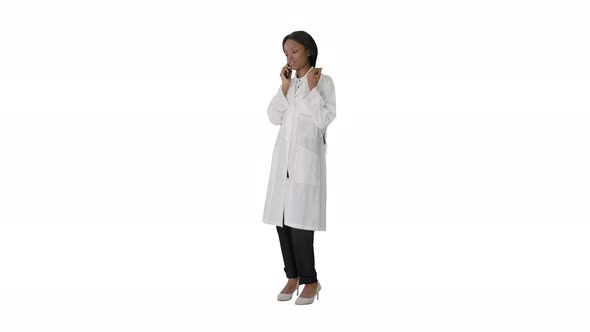 African American Female Doctor Talking on the Phone on White Background alt