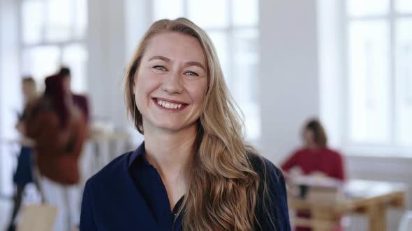 Close-up Portrait of Happy Professional Female Boss with Blond Hair in Formal Clothes Posing at alt