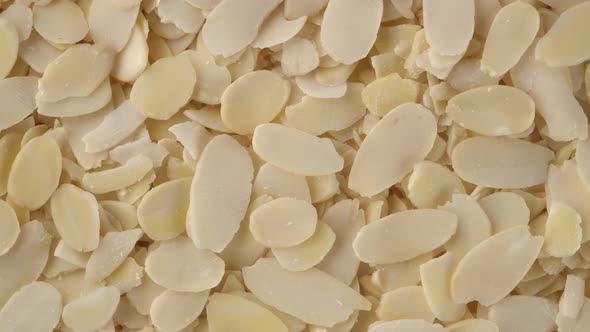 Sliced almonds top view, rotation alt