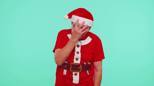 Upset Senior Christmas Old Man Making Face Palm Gesture Feeling Bored Disappointed Bad Result alt