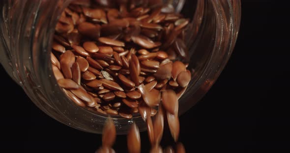 Pour Flax From A Glass Jar