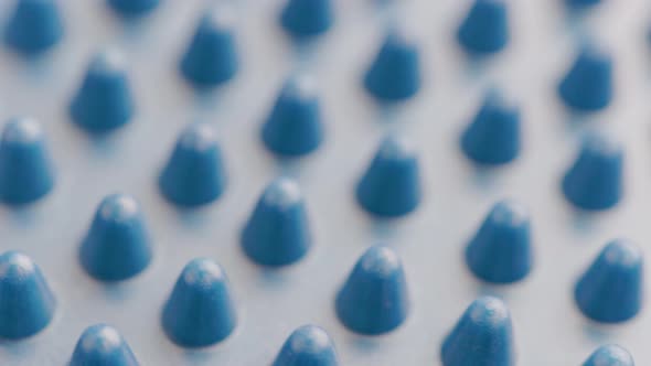 Looped Slowly Spinning Blue Rubber Spikes on Massager or Balance Disk alt