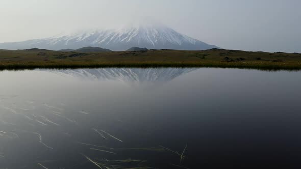 morning reflection of the volcano in the lake