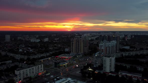 Epic aerial sunset in city residential district