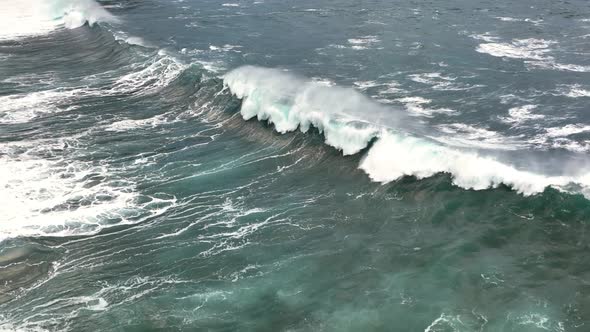 Slow Motion Drone Video of Ocean Waves Crashing the Shore alt