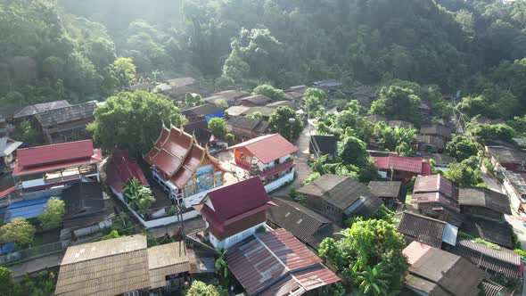 Aerial view of Paa Meang village,  Houses in valley, Lampang, Thailand by drone