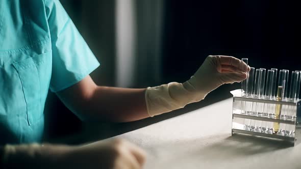 Doctor holding a coronavirus COVID-19 test tube