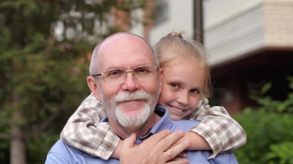 Portrait of Grandfather and Child