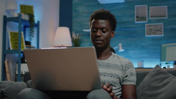 Close Up of Business Person Using Laptop for Remote Work alt