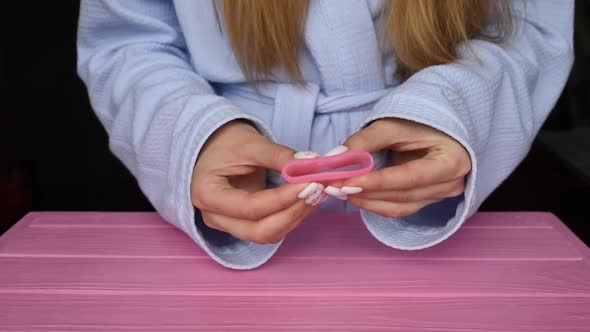 Close Up Menstrual Cup Silicone Girl Hands Holding Compress c u Folding alt