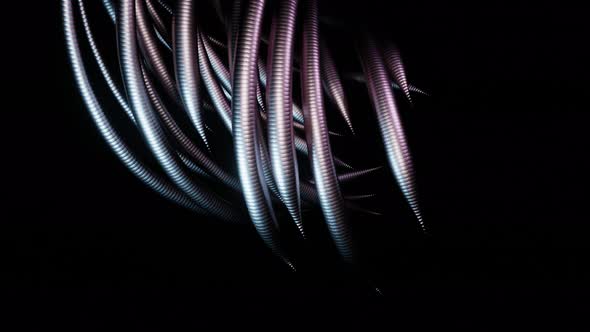 Scifi Horror Tentacles or Worms with Metallic and Neon Tint Move on Black Background alt