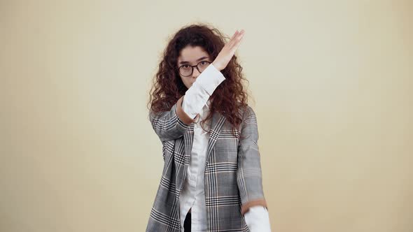 The Responsible Young Woman with Folded Hands Says Stop Safety is at the Forefront alt