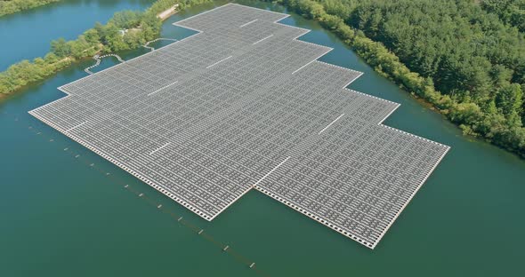 Electric renewable power in the ecological energy of solar power station float on water pond alt