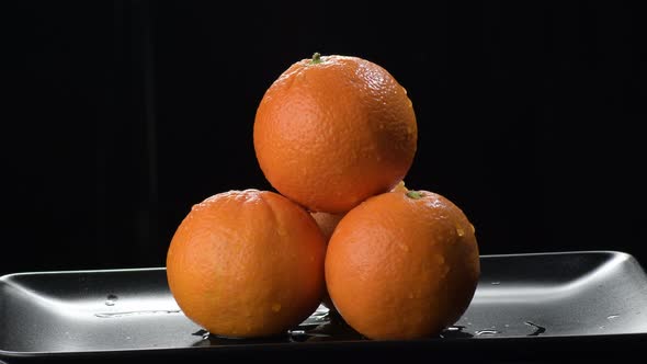 Oranges Fruit on a Black Tray alt