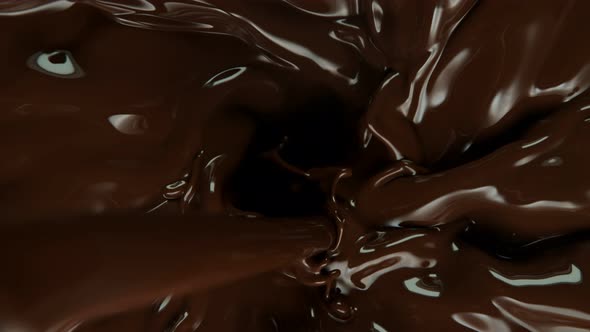Super Slow Motion Shot of Pouring Melted Chocolate Into Vortex at 1000 Fps alt