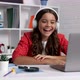 Happy Teen Girl Laughing While Something Funny in Headphones at Laptop Happiness - VideoHive Item for Sale