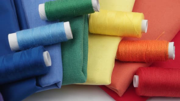 Fabrics and threads in rainbow colors