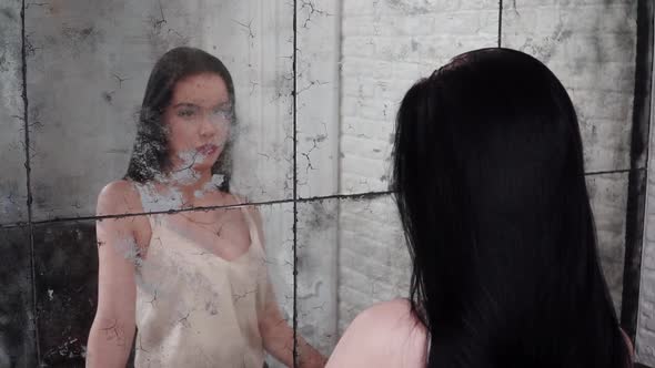 Cute Girl Posing Near the Mirror