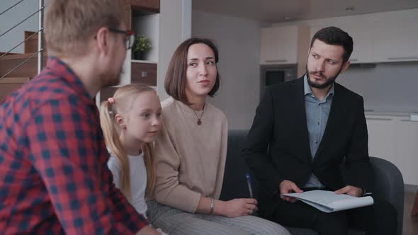 Woman Discussing Buy, Sale or Rent New House with Her Husband