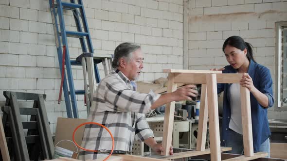 Senior man and woman fit wood alt